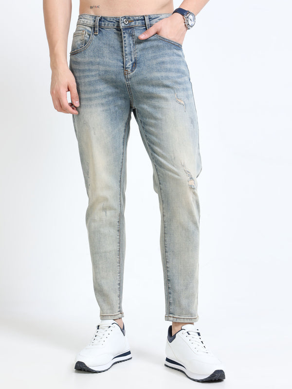 Light Wash Distressed Slim Fit Jeans