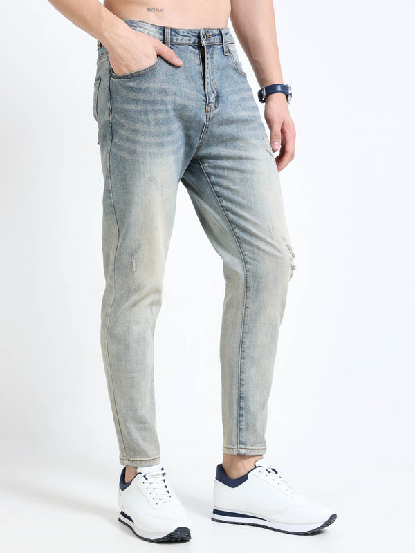 Light Wash Distressed Slim Fit Jeans